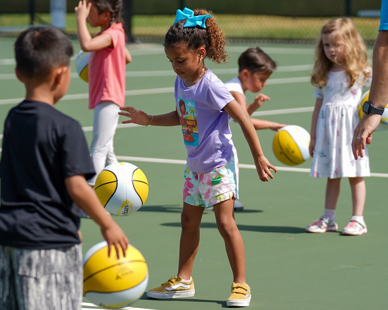 OW_RisingStars_boy_girl_basketball_dribble