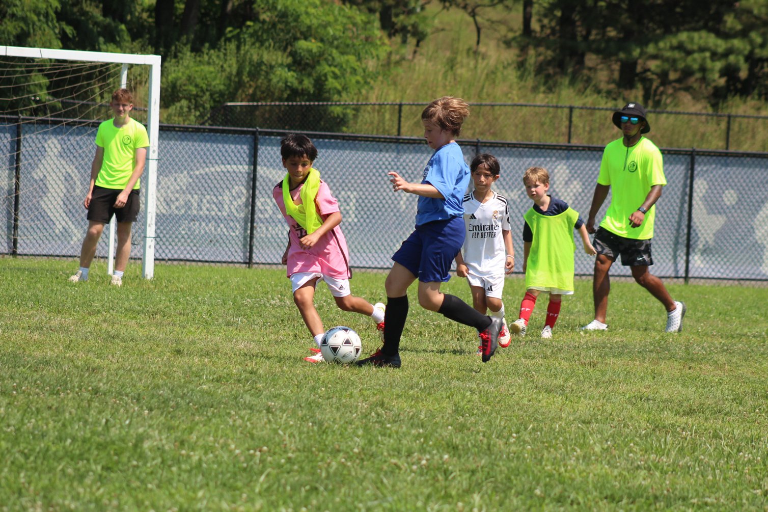 SH_Soccer_boys_kick_field