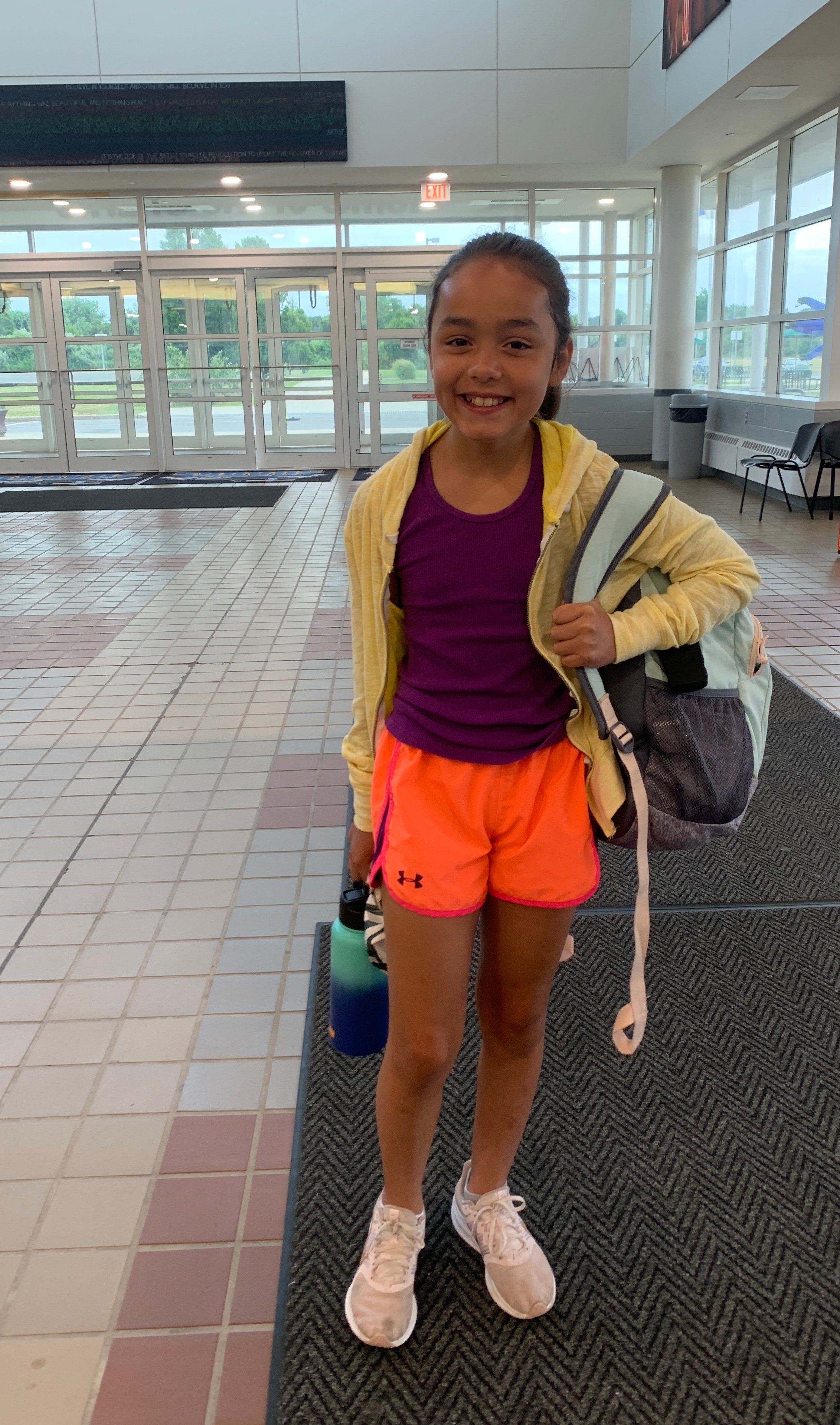 girl packed for cheerleading camp